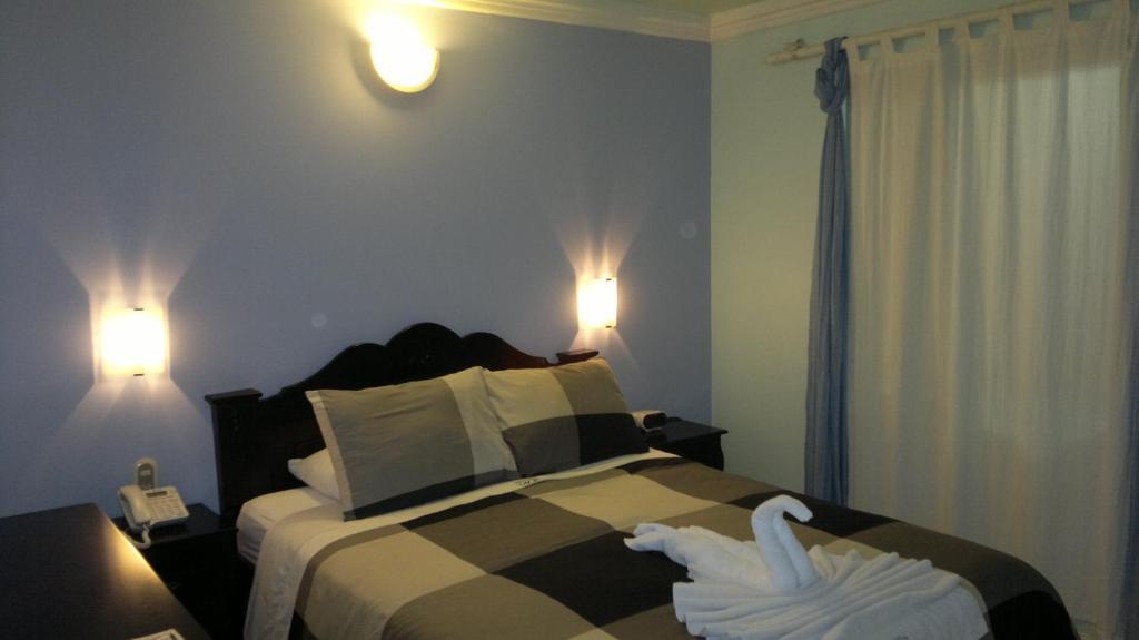 Hotel Eskalima Alajuela Стая снимка
